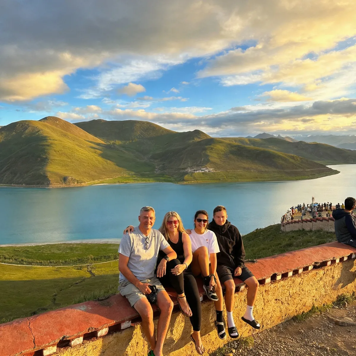 Travelers overlooking Yamdrok Lake in Tibet