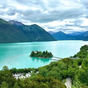 Basomtso Lake with forested shores in Nyingchi Tibet