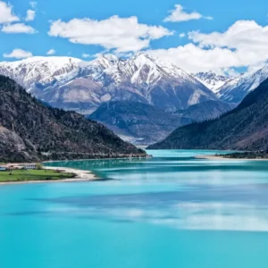 Ranwu Lake turquoise water and mountains in Nyingchi Tibet
